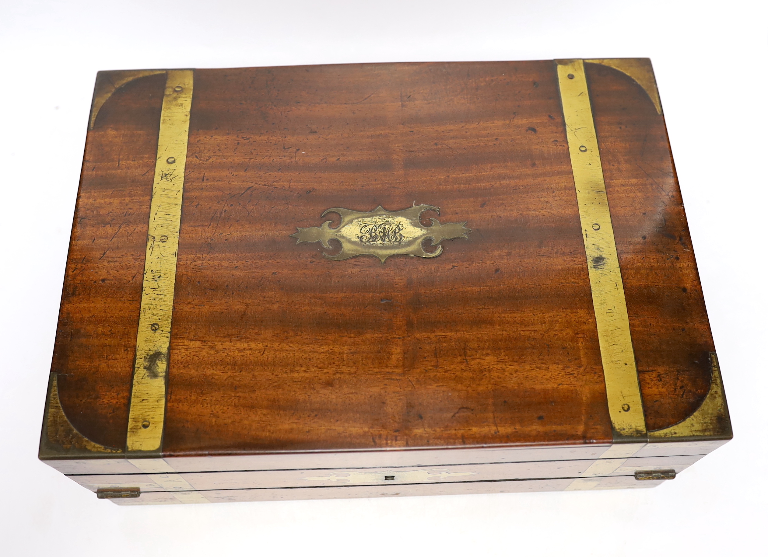 A 19th century brass bound mahogany writing slope, 35cm wide x 13.5cm high x 25cm deep